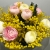 Букет "Маффин" из ранункулюсов и мимозы в Хотьково