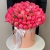 Композиция в шляпной коробке из 113 пионов Корал Шарм в Хотьково